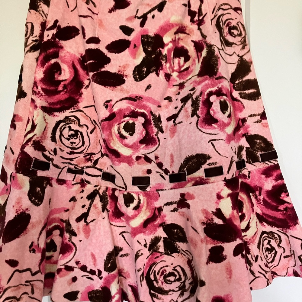 Mid length beautiful floral skirt with adorable ribbon accents